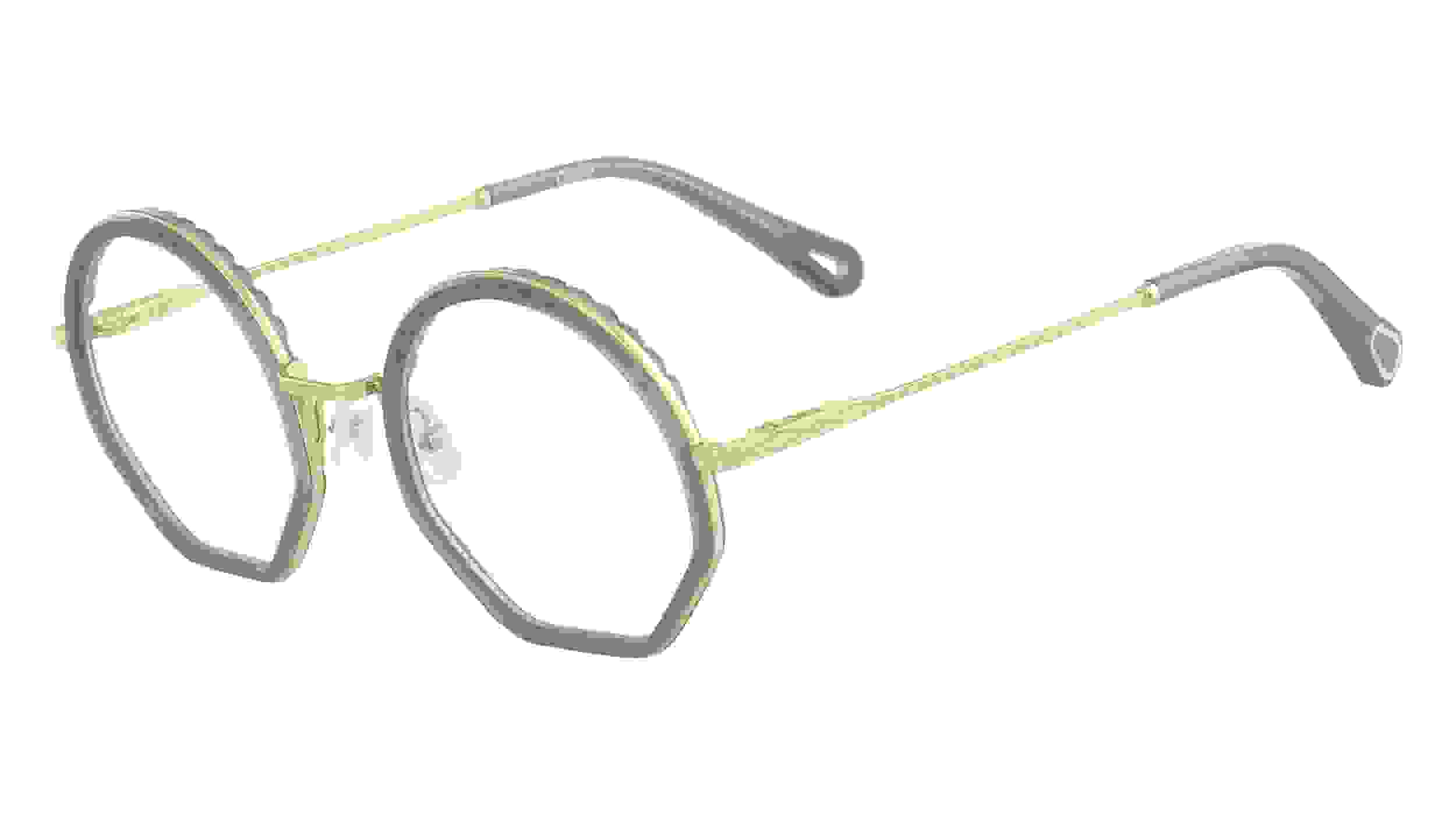 Cloé Korrekturbrille mit runden Brillengläsern und goldenem Gestell und blauen Akzenten an Brillenrahmen und Bügelenden.